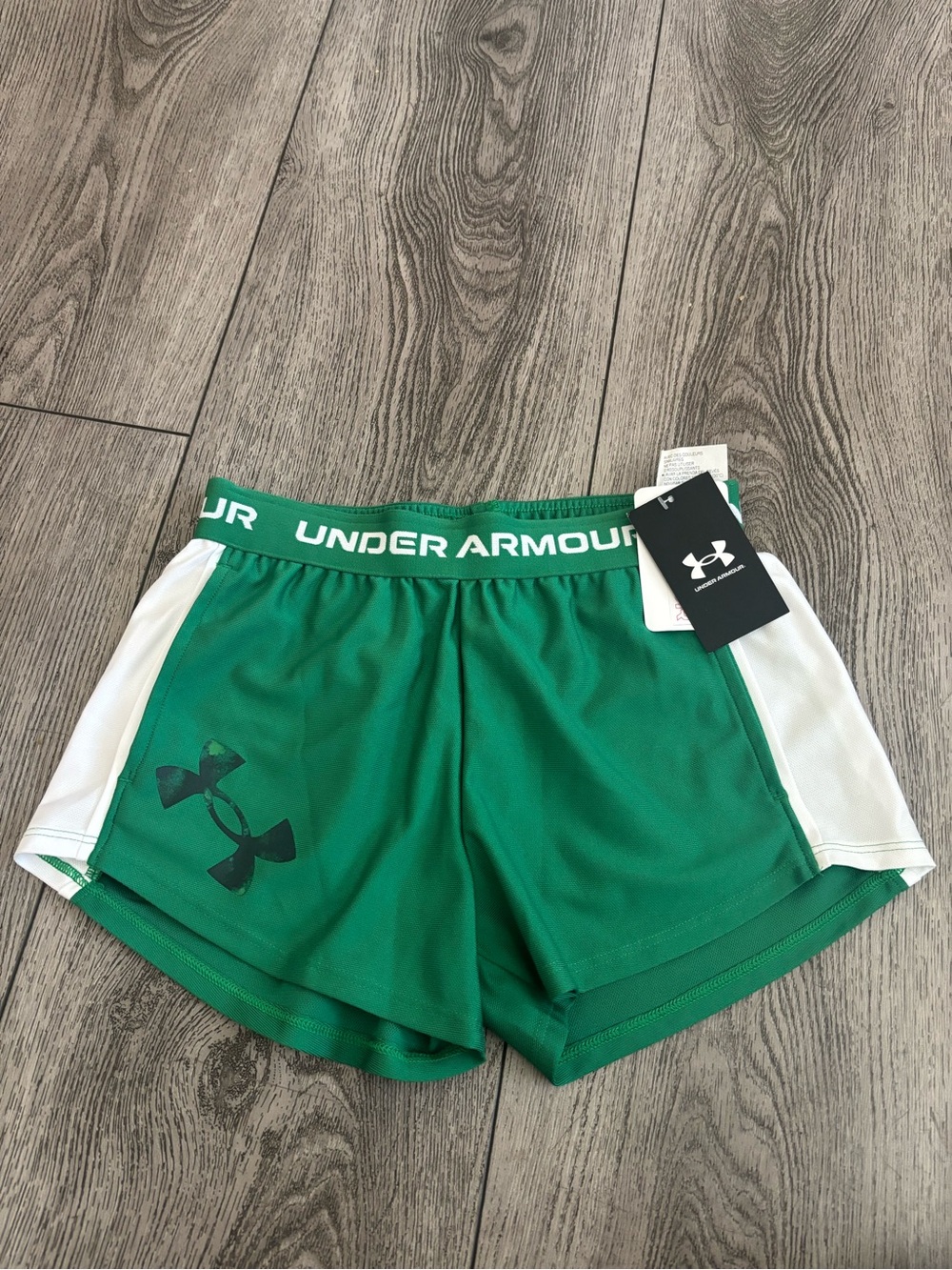 Under Armour kids Green Athletic Shorts with White Side Panels and Logo